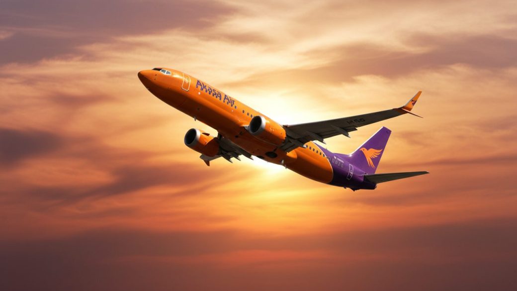 A single Akasa Air Boeing 737 MAX jet climbing into a dramatic golden sky, clean uncluttered background, high-contrast cinematic lighting, no text