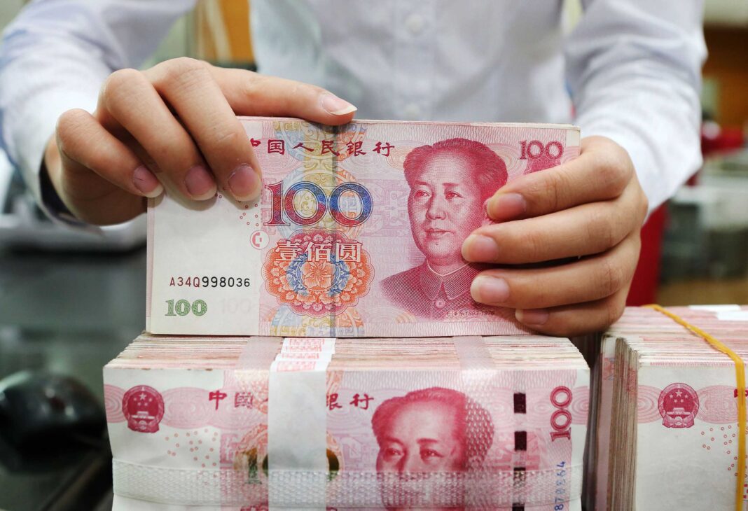Chinese Yuan hits 14-month high against dollar
