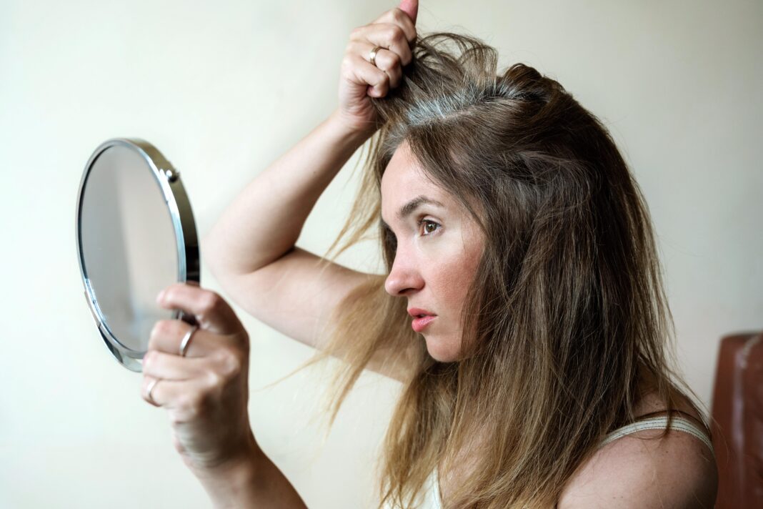 Reversing Gray Hair: Scientists Discover Cellular “Traffic Jam” is the Real Culprit